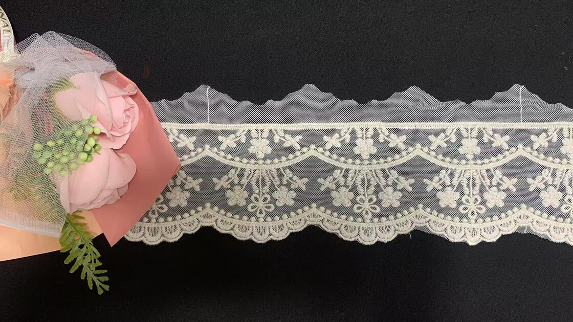 Quality Exquisite French Wave Pattern Eco-Friendly Voile Lace with Water-Soluble Mesh and Embroidery Stretch Fabric factory