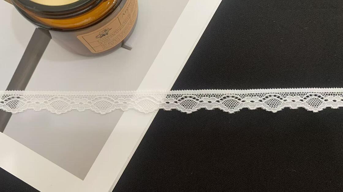 Quality 1.5cm Classic White Hollow-out Lace Trim with Diamond Pattern and Scalloped Border for Wedding and Children's Clothing factory