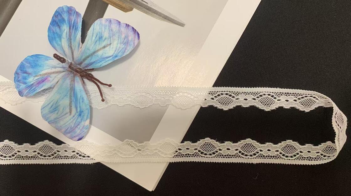 Quality 1.5cm Classic White Hollow-out Lace Trim with Diamond Pattern and Scalloped Border for Wedding and Children's Clothing factory