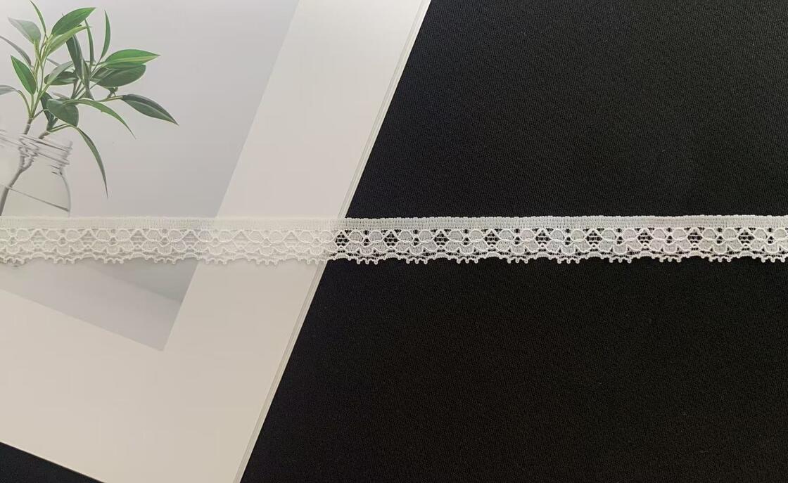 Quality 1.2cm White Symmetric Hollow-out Nylon Lace Trim with Delicate Scalloped Edge Eco-Friendly Elastic Fabric for Garment Sewing factory