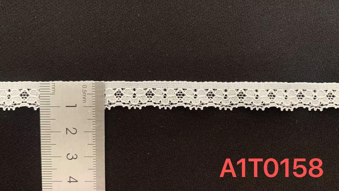 Quality 1.2cm White Symmetric Hollow-out Nylon Lace Trim with Delicate Scalloped Edge Eco-Friendly Elastic Fabric for Garment Sewing factory