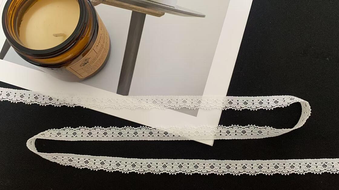 Quality 1.2cm White Symmetric Hollow-out Nylon Lace Trim with Delicate Scalloped Edge Eco-Friendly Elastic Fabric for Garment Sewing factory