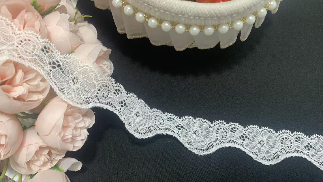 Quality A1T0140/A1T0141 Spandex/Nylon Knitted Embroidery Elastic Lace Trim 2.5-3cm for Garment Decoration factory