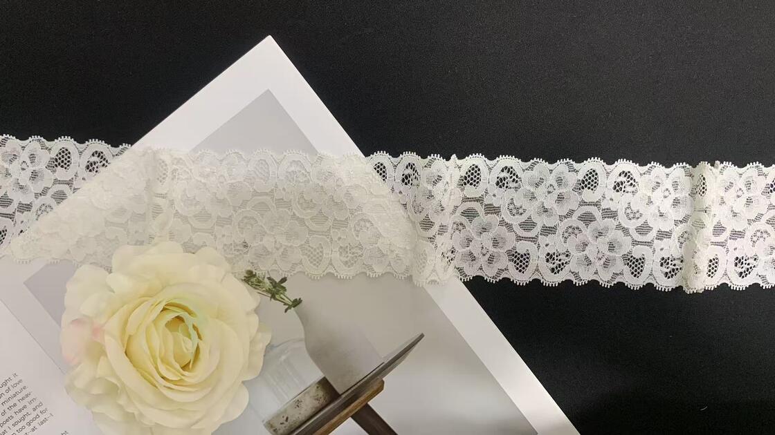 Quality Exquisite White Heart-floral Lace with Dotted Hollow Mesh, Soft Stretch Nylon for Garment and Intimate Wear Trimming factory