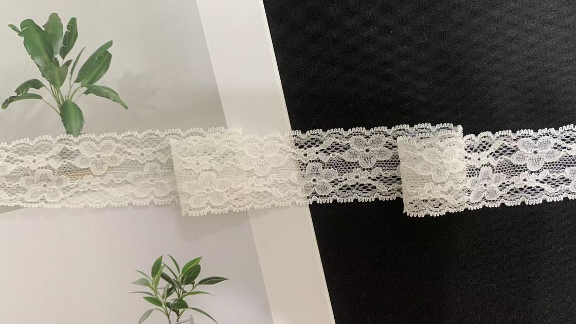 Quality 3.5cm White Four-leaf Floral Hollow Lace Trim with Tiny Scalloped Edges Soft Nylon Fabric for Women's Dresses factory