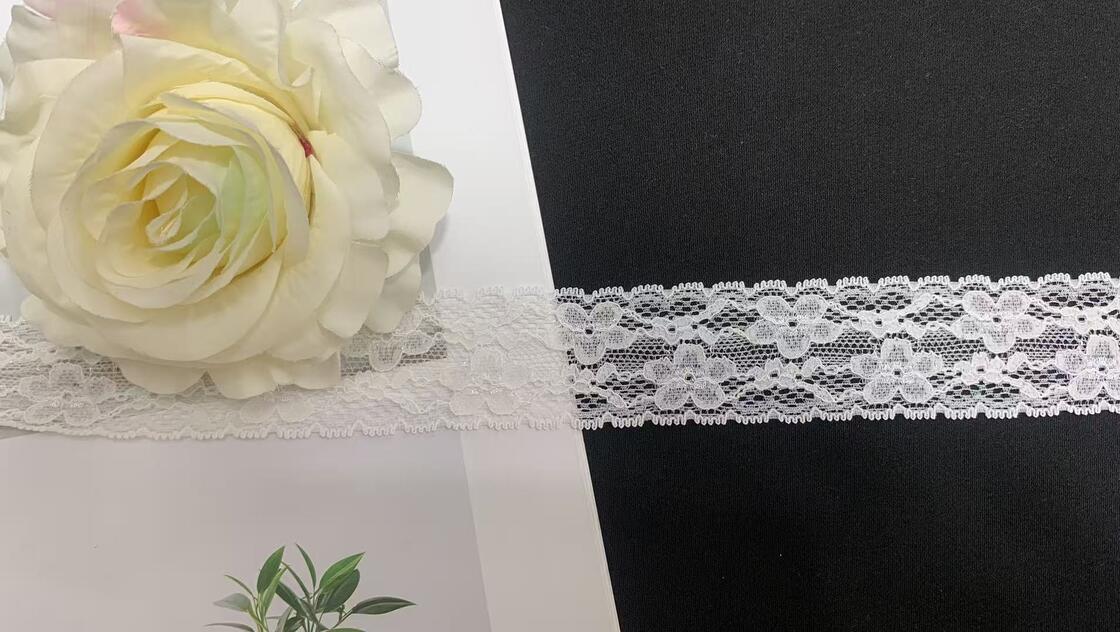 Quality 3.5cm White Four-leaf Floral Hollow Lace Trim with Tiny Scalloped Edges Soft Nylon Fabric for Women's Dresses factory