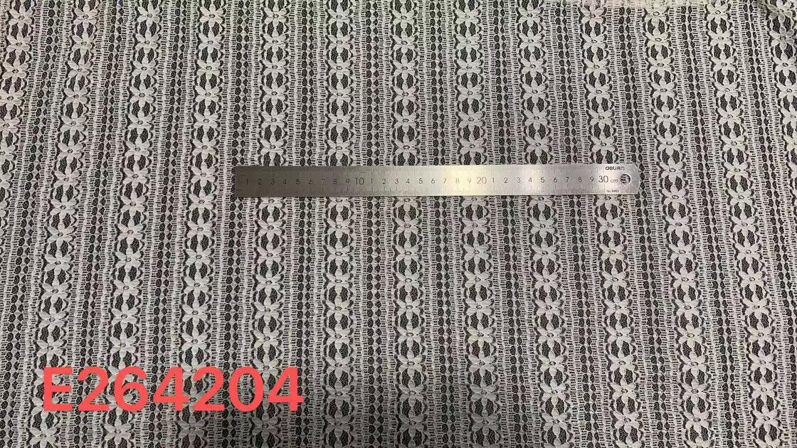 Quality 100% nylon/spandex Vertical Floral Striped Lace Fabric, Continuous Flower Stripe Hollow Mesh Lace for Women Dress Lingerie factory