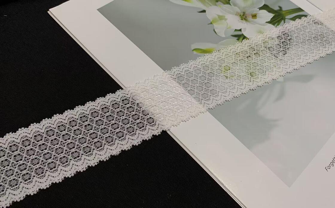 Quality 4.5cm Hollow Oval Jacquard Lace Trim with Double Scalloped Edge for Garment Decoration factory
