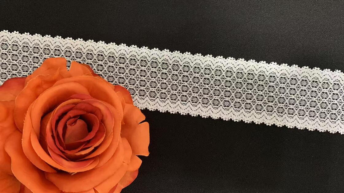 Quality 4.5cm Hollow Oval Jacquard Lace Trim with Double Scalloped Edge for Garment Decoration factory