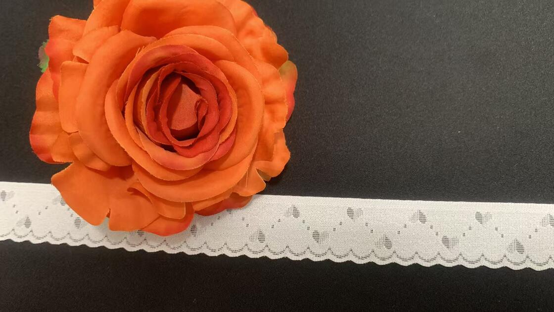 Quality 2.7cm Nylon Spandex Elastic Lace Trim with Hollow Heart Cutout and Scalloped Wave Edge for Lingerie Decoration factory