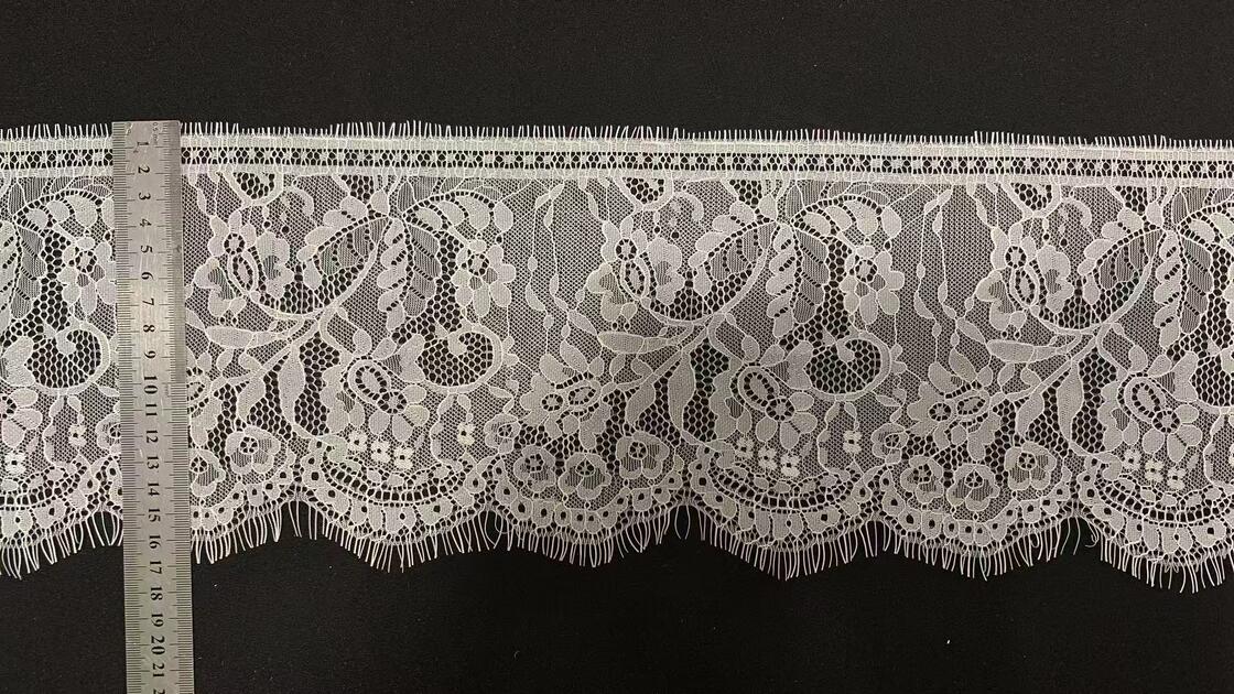 Quality Bulk Supply Pure Nylon Eyelash Lace Trim with 17cm Width and Hollow Floral Pattern for Formal Dress Decoration factory