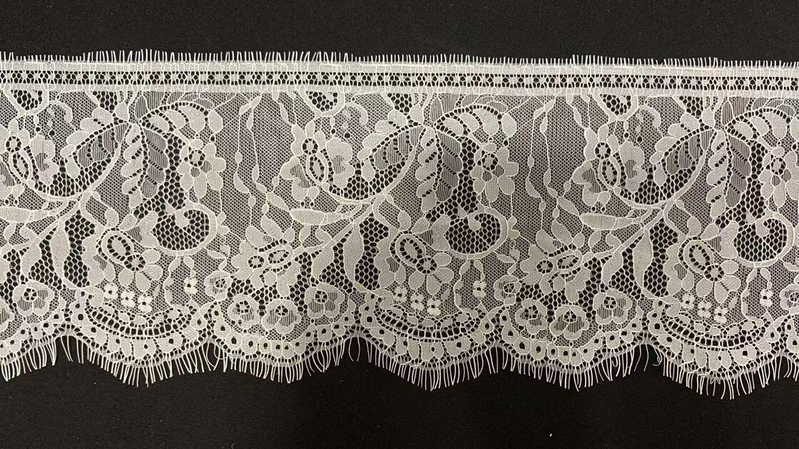Quality Bulk Supply Pure Nylon Eyelash Lace Trim with 17cm Width and Hollow Floral Pattern for Formal Dress Decoration factory