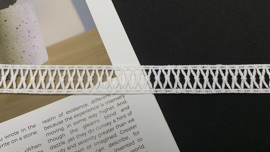 Quality 2cm Milk Yarn Water Soluble Lace Trim with Continuous Cross Geometric Patterns Soft Hollow Strip Smooth Texture Great for Garment Edging and Handmade Craft Decoration factory