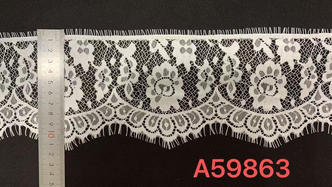 Quality Pure Nylon Eyelash Lace Trim with Hollow Floral Pattern and Eyelash Fringe Edge for Garment Decoration factory