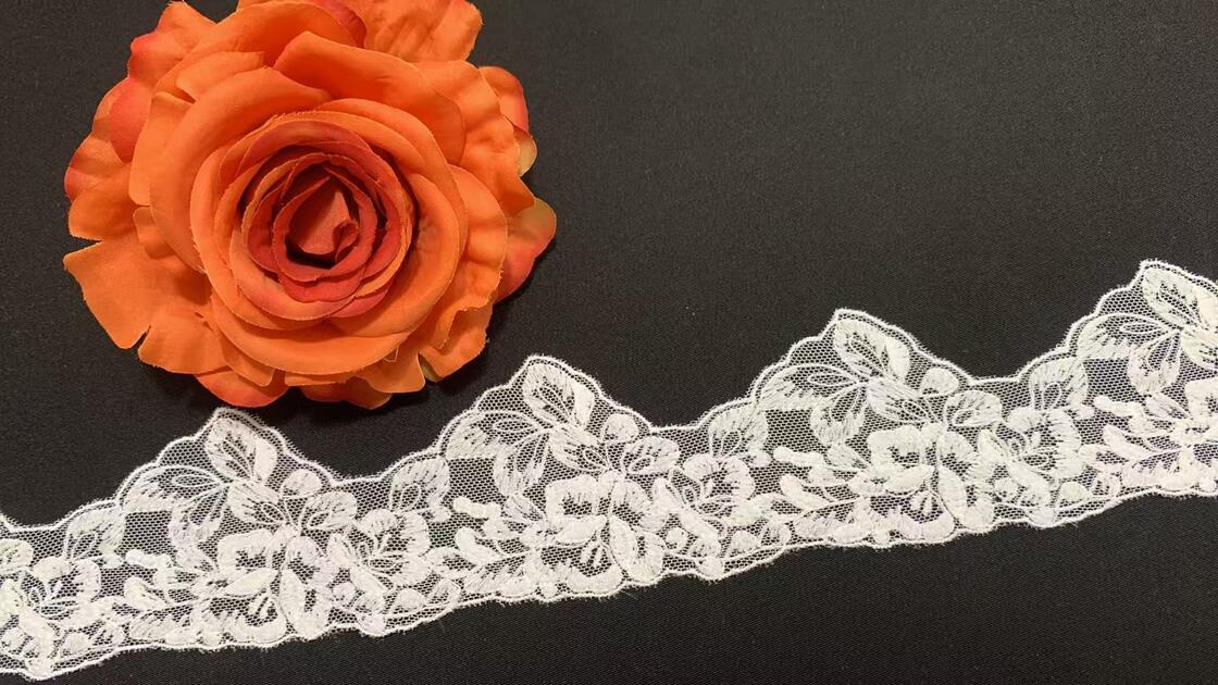 Quality 6cm Width Milk Yarn Lace Trim with Elegant Floral Design and Wavy Scalloped Border for Dress Decoration factory