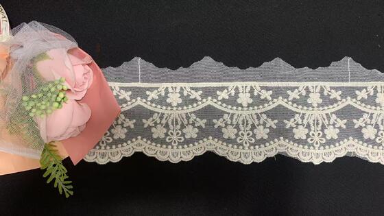 Quality Exquisite French Wave Pattern Eco-Friendly Voile Lace with Water-Soluble Mesh and Embroidery Stretch Fabric factory