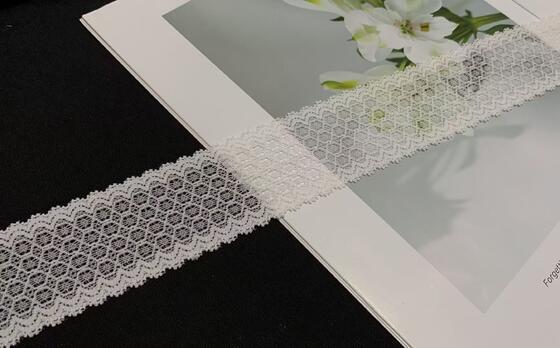 Quality 4.5cm Hollow Oval Jacquard Lace Trim with Double Scalloped Edge for Garment Decoration factory