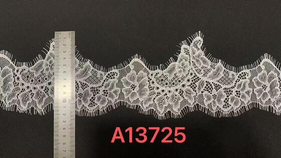 Quality Pure White 12cm Width Hollow Floral Eyelash Lace Trim for Bridal Gown and Garment Edge Decoration factory