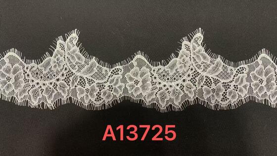 Quality Pure White 12cm Width Hollow Floral Eyelash Lace Trim for Bridal Gown and Garment Edge Decoration factory