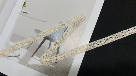 Quality 1.5cm Cotton Crochet Lace Trim with Symmetrical Hollow Geometric Shape and Soft Hand Feel for Garment Trimming factory