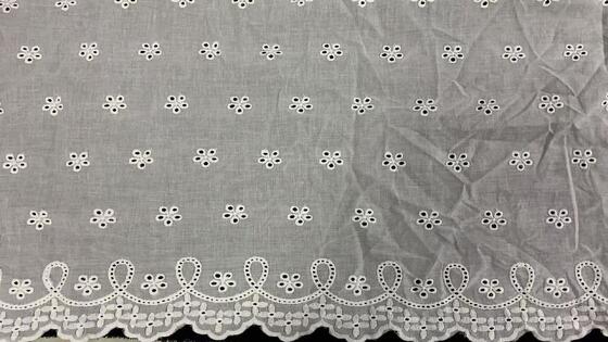 Quality Cotton Eyelet Cutwork Fabric, All‑Over Floral Embroidery with Decorative Scalloped Edge for Dress Sewing factory