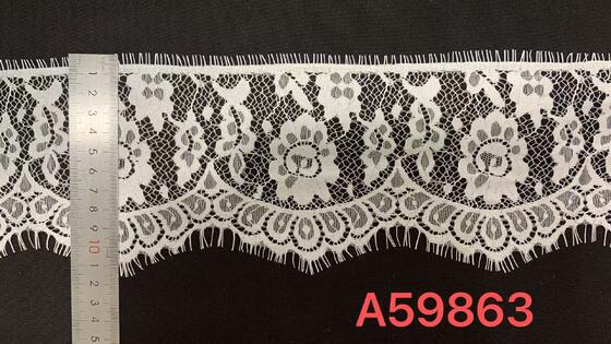 Quality Pure Nylon Eyelash Lace Trim with Hollow Floral Pattern and Eyelash Fringe Edge for Garment Decoration factory