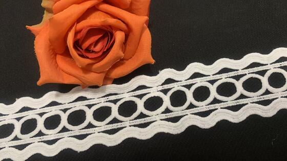 Quality 5cm Width Milk Yarn Embroidery Lace Trim with Multi-layer Geometric Design and Tidy Cut Edge for Apparel Decoration factory