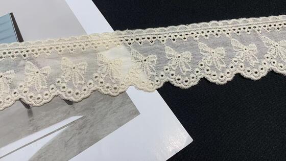 Quality Cotton Chicken Lace Trim with Delicate Bow Embroidery Wavy Scalloped Borders and Neat Hollow Eyelet Details for Garment Trimming factory